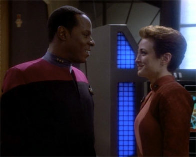 Sisko and Kira exchanging smiles instead of threats.